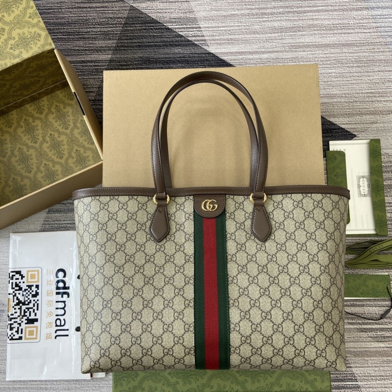 G*u*i shopping bags